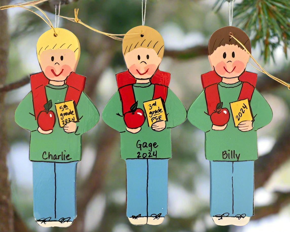 School child with backpack and apple